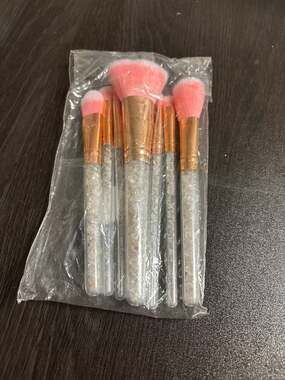 7-Piece Rose Gold and Pink Moon stone Crystal Infused Makeup Brush Set.